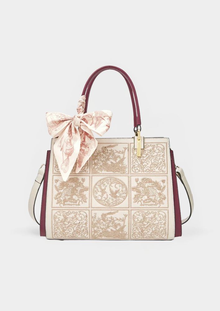 Wójcik™ | Wyjątkowa torebka crossbody z haftem i kokardą